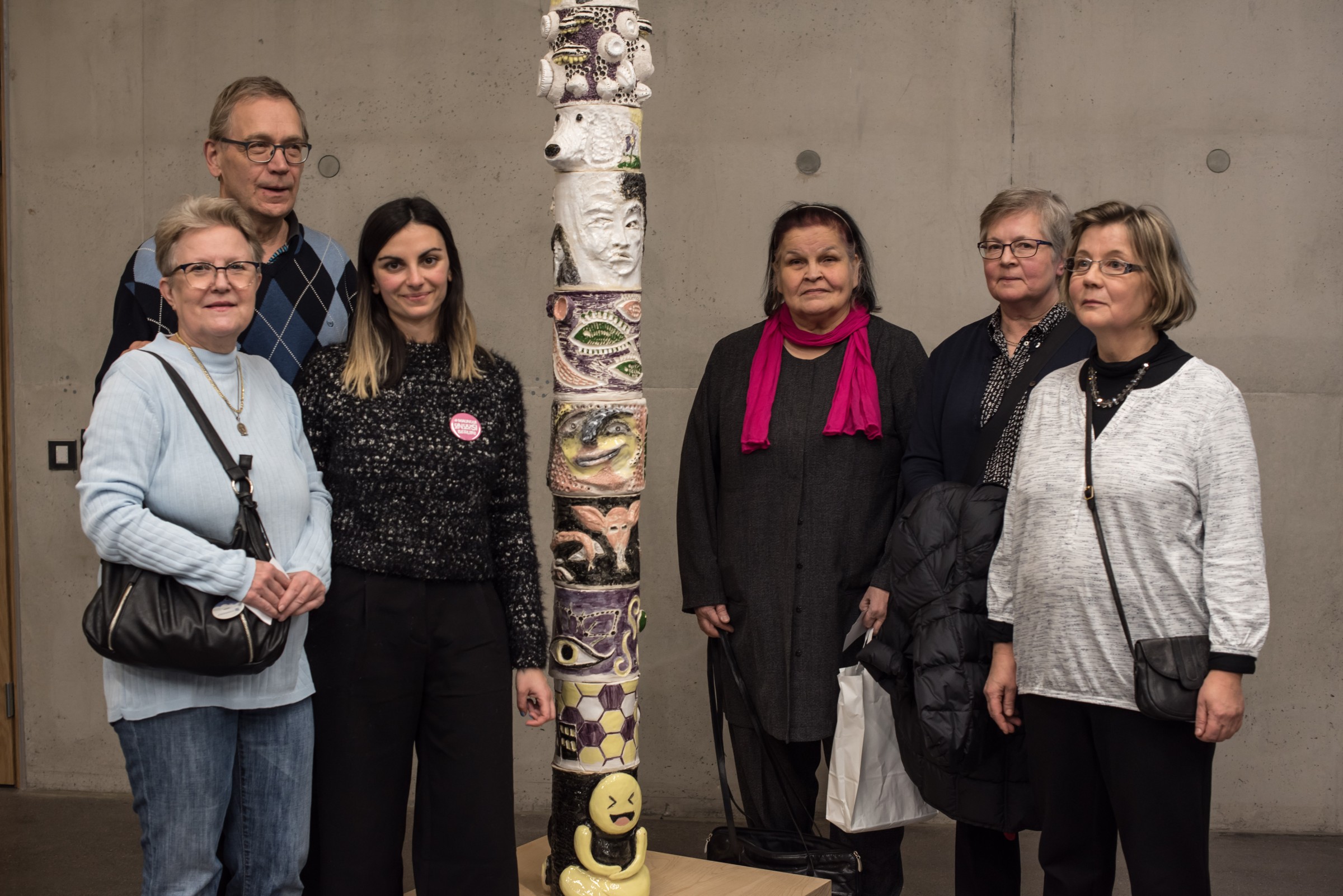 Valentina Karga participants around the Maunula totem