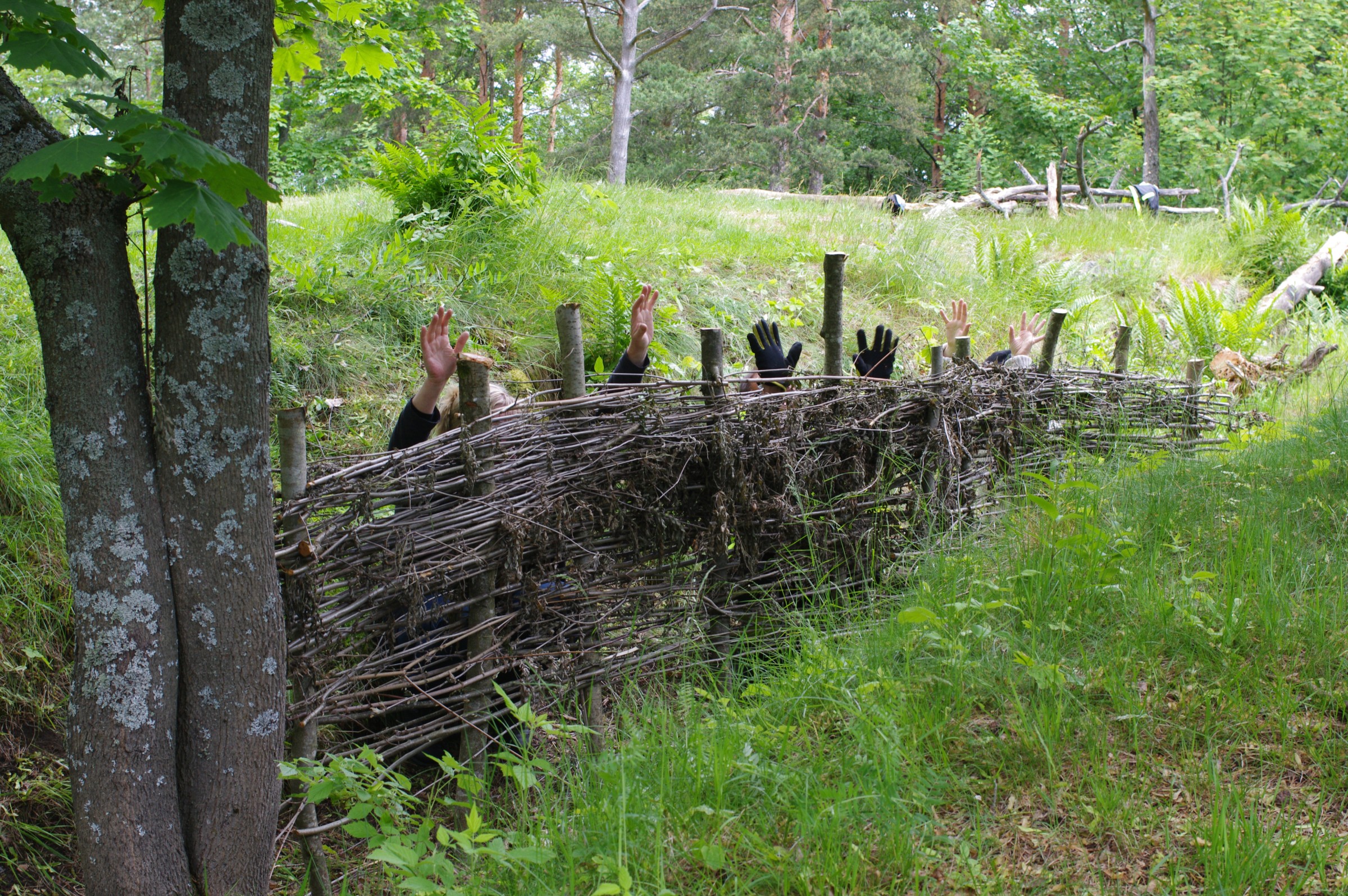 Martial Law at Patterimäki park hands up behind a fence