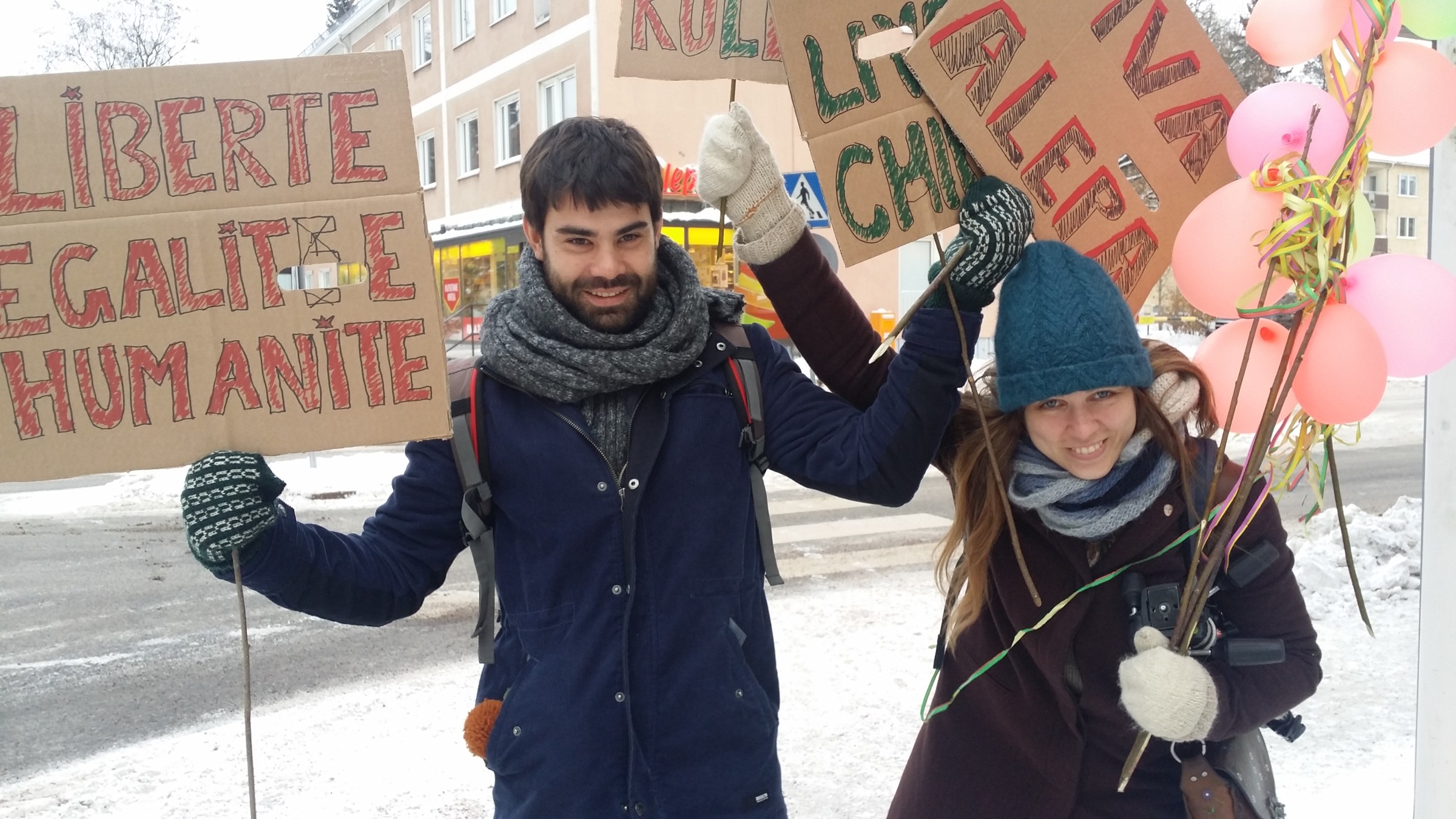 Thomas Martin and Riikka Kuoppala holding placates from Maunula-film