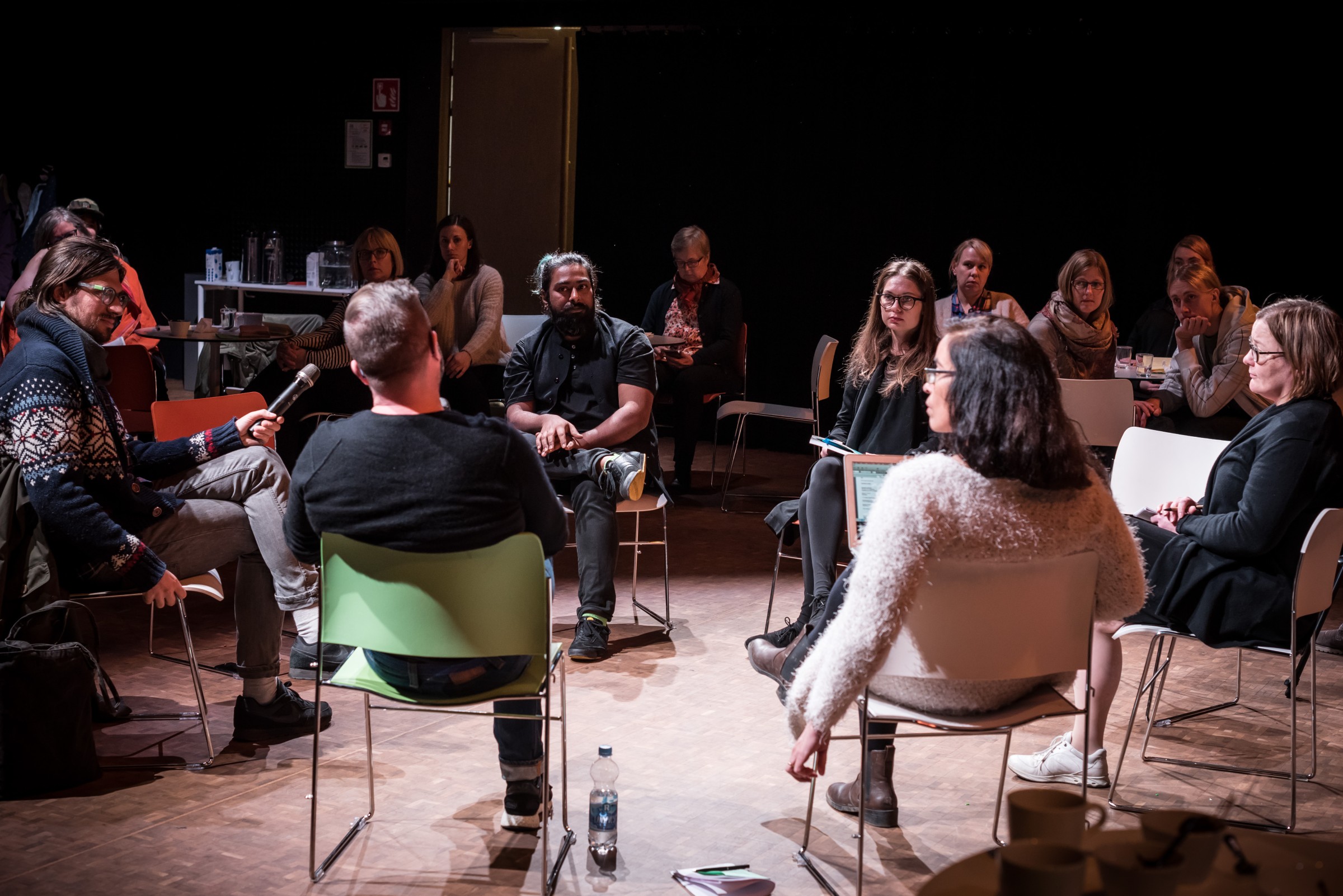 Maunula Remix speakers in circle listening