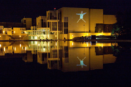 Giants of the Hoods dancer on facade in Tapiola