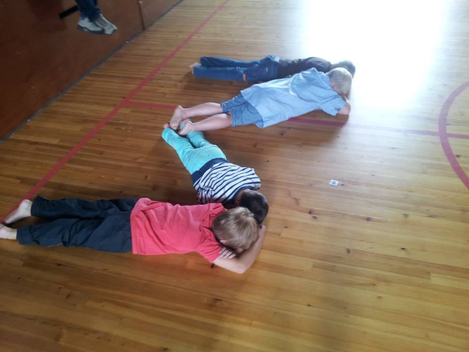 Urban Alphabets workshop, children making a letter M