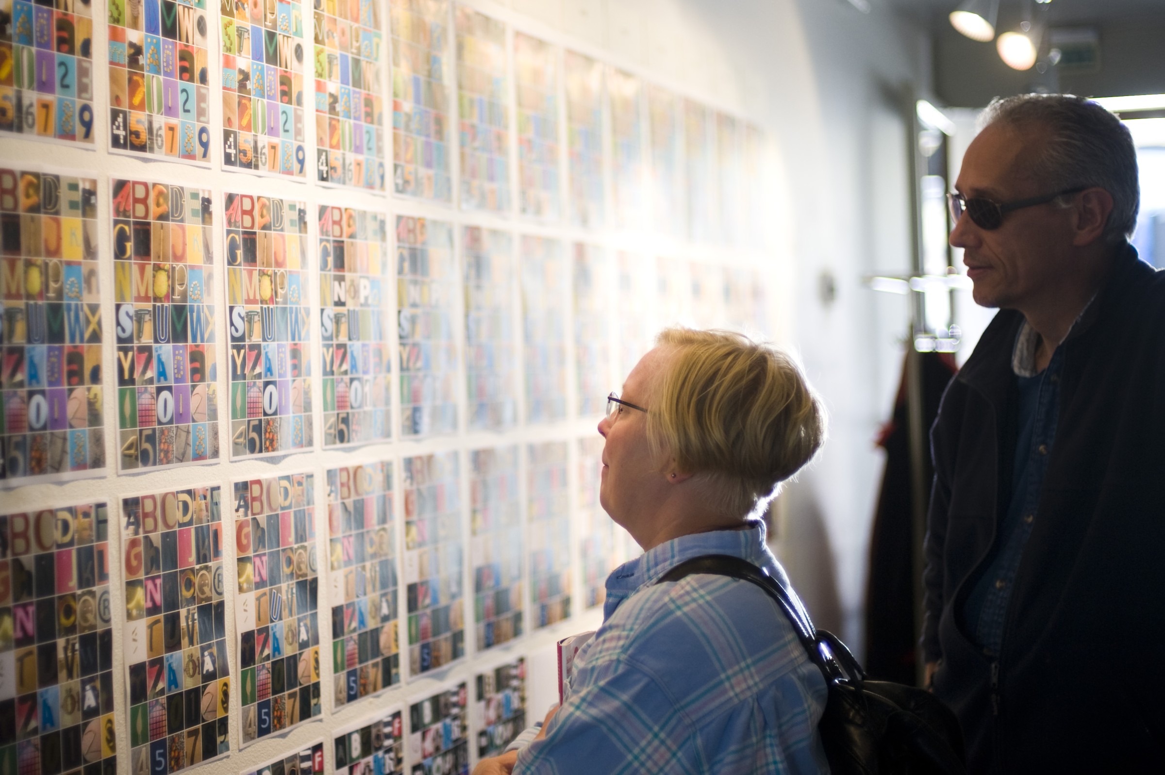 Urban Alphabets exhibition visitors at Lasipalatsi gallery