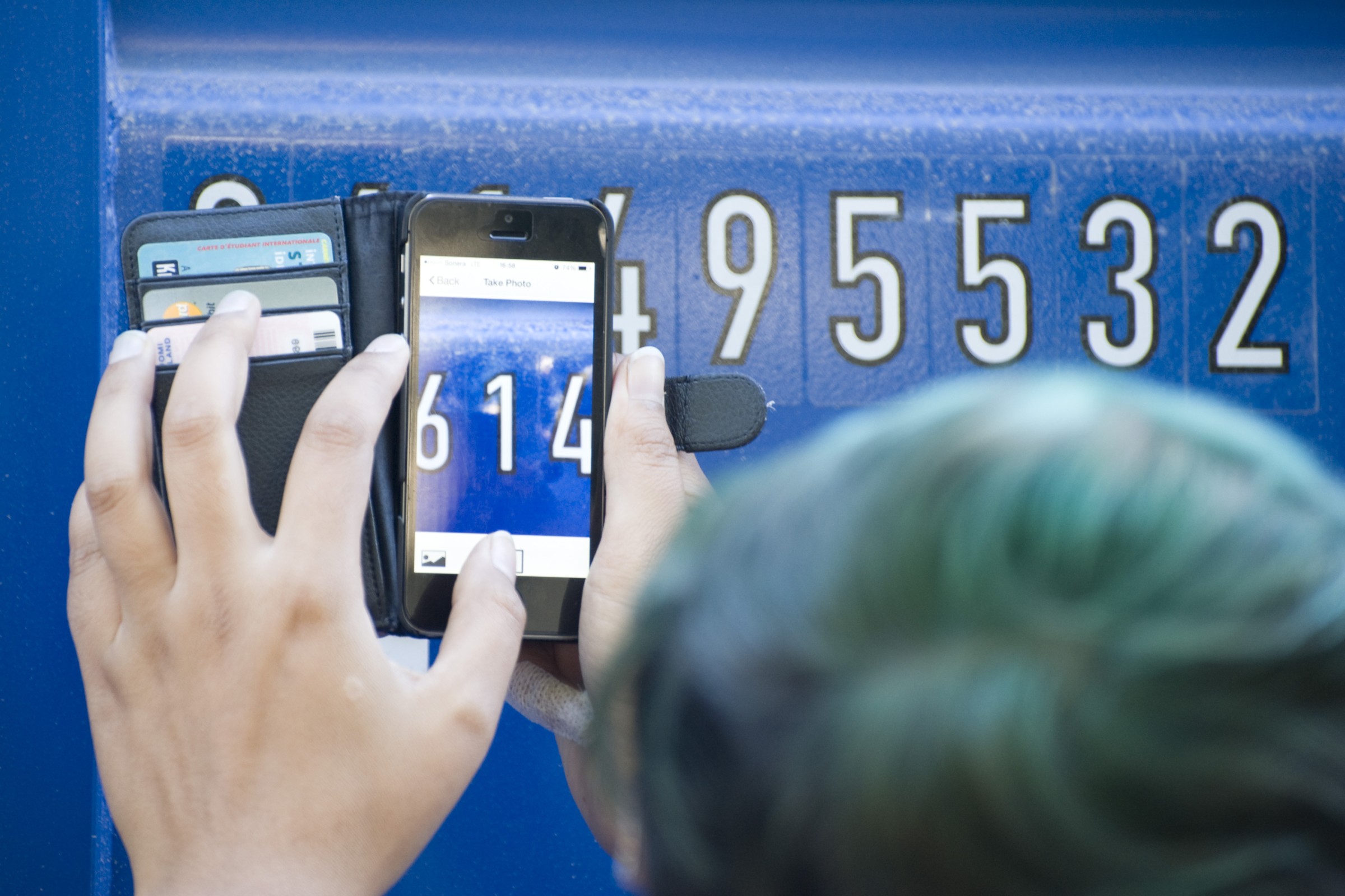 Urban Alphabets workshop, participant taking a picture of numbers