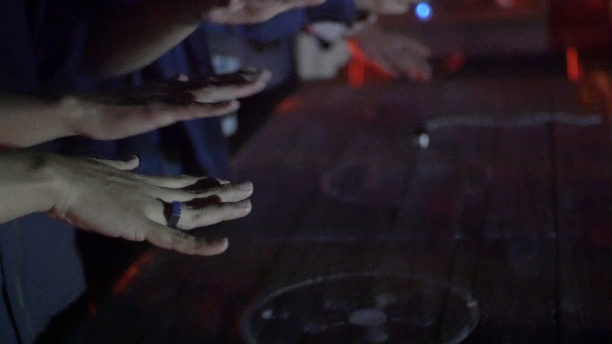 Conducting Senses detail of hands of a participant composing with the interactive tech