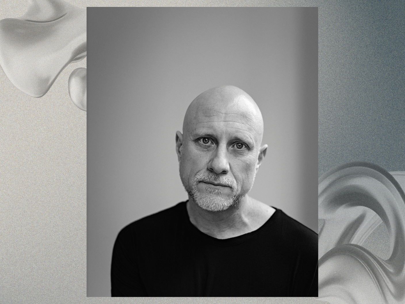 Person in black and white and a grey backdrop.